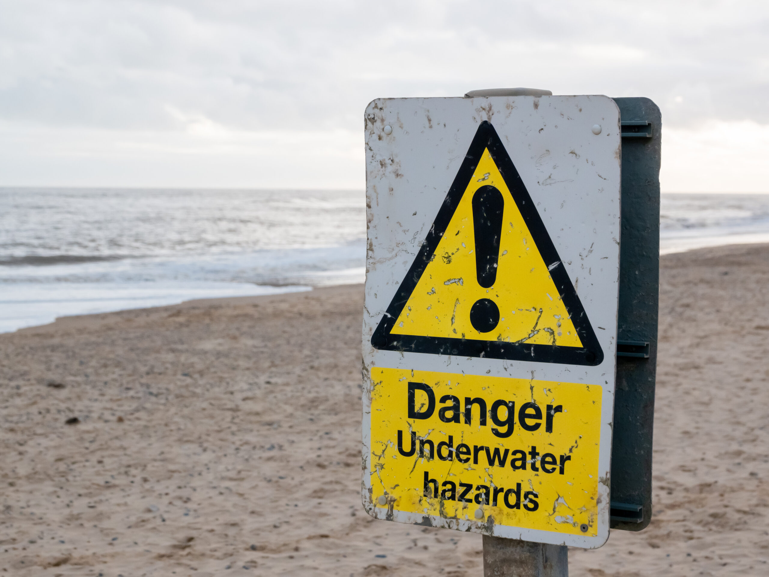Yellow triangle danger sign of underwater hazards | Control Point®