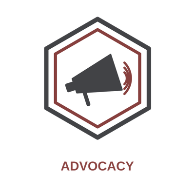 Advocacy badge: hexagonal emblem featuring a black megaphone icon inside a bordered hexagon, with the word ADVOCACY beneath.